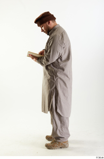 Luis Donovan Afgan Reading Book Standing reading standing whole body…